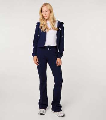 Pink Vanilla Navy 1997 Embroidered Pin Tuck Flared Trousers