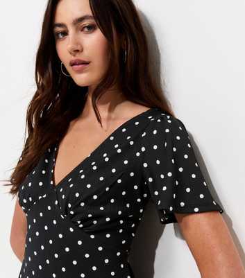 Black Crinkled Polka Dot Flutter Sleeve Tea Blouse