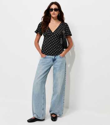 Black Crinkled Polka Dot Flutter Sleeve Tea Blouse