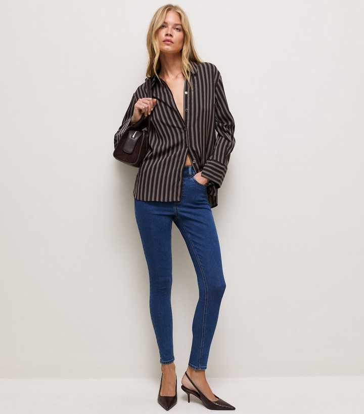 Blue Amie Stretch Mid Rise Skinny Jeans