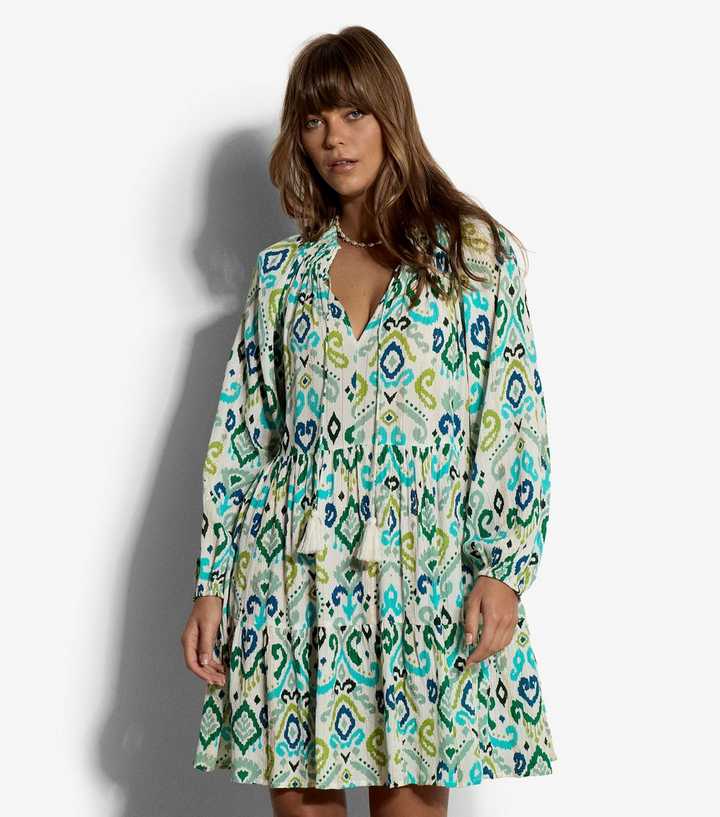Apricot White Ikat Swirl Print Babydoll Dress