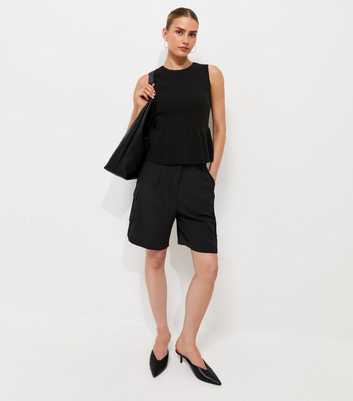 Black Compact Knit Peplum Waist Vest Top