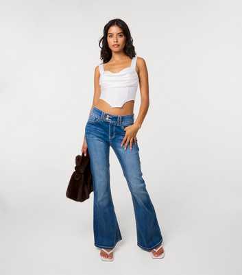 Pink Vanilla Blue Embroidered Butterfly Pocket Flared Jeans