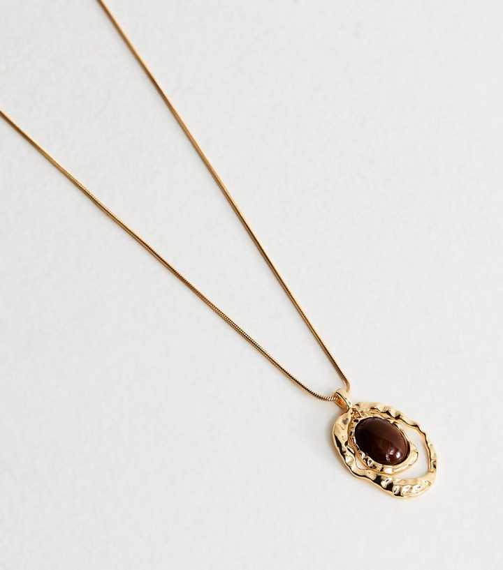 Gold Tone Brown Long Beaten Oval Pendant Necklace