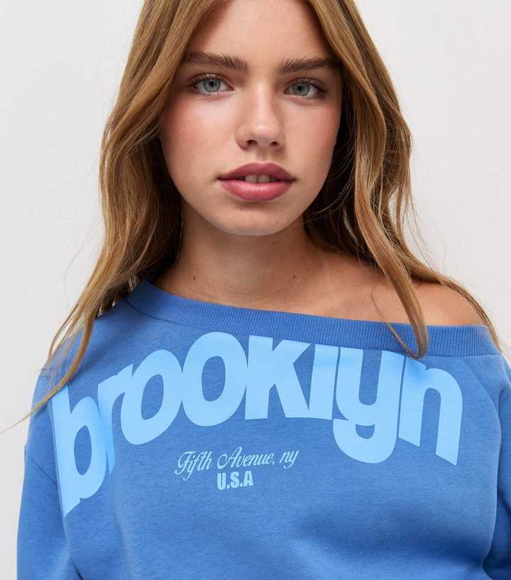 Girls Blue Cotton Rich Brooklyn Print Off Shoulder Sweatshirt