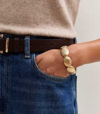 Gold Tone Ridged Oval Stretch Bracelet