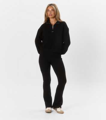 Peach:Fit Black Ribbed Flared Leggings